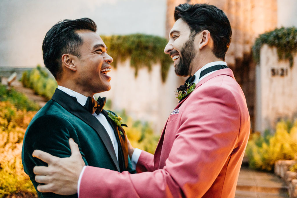 Sowden House Wedding in Los Angeles: candid photo of grooms