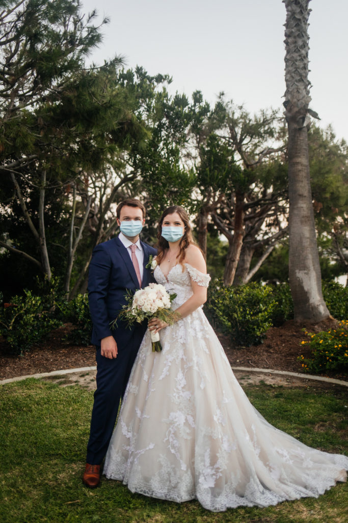 bride and groom wear masks during covid-19