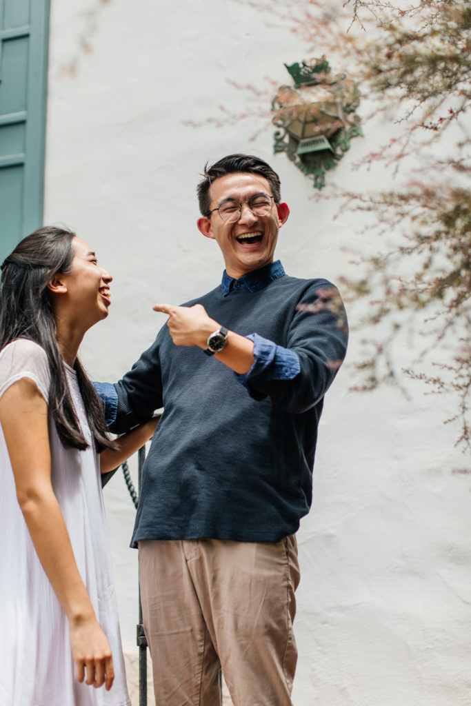 bride and groom laugh during their engagement photos in Santa Barbara 
