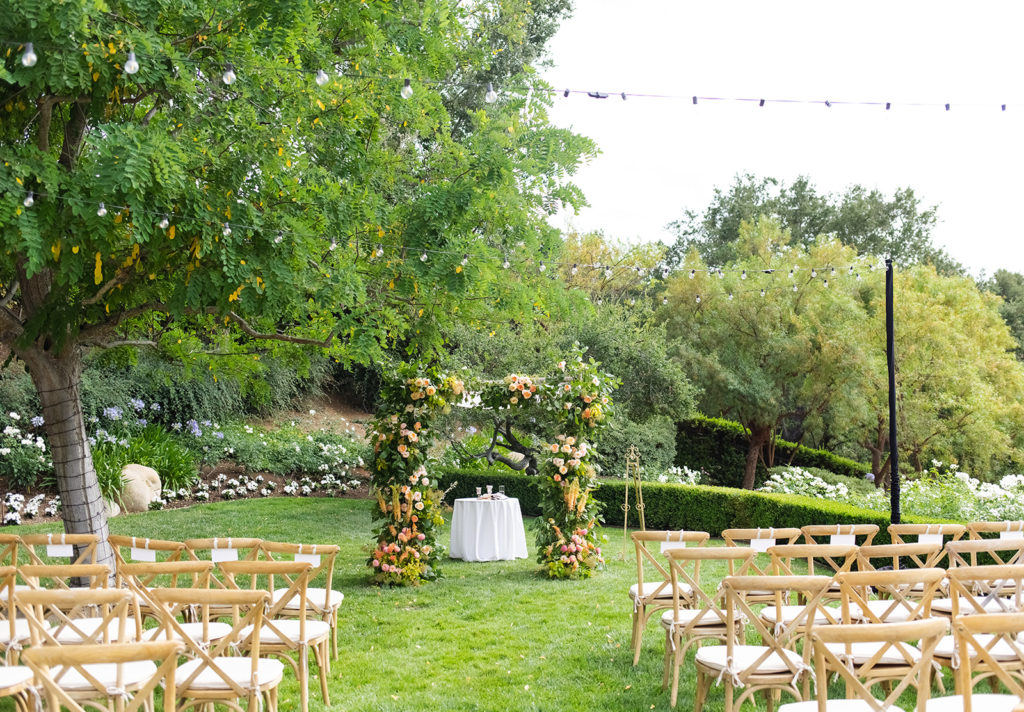colorful chuppah sits at the front of the wedding ceremony