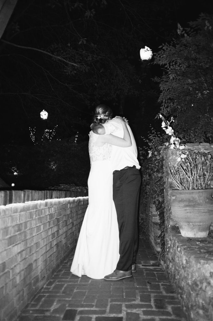 bride and groom kiss at the end of the night