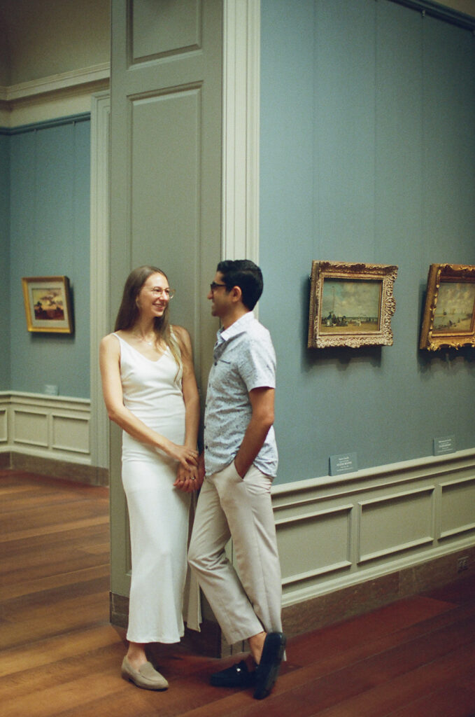 couple strolls an art gallery in Washington DC together