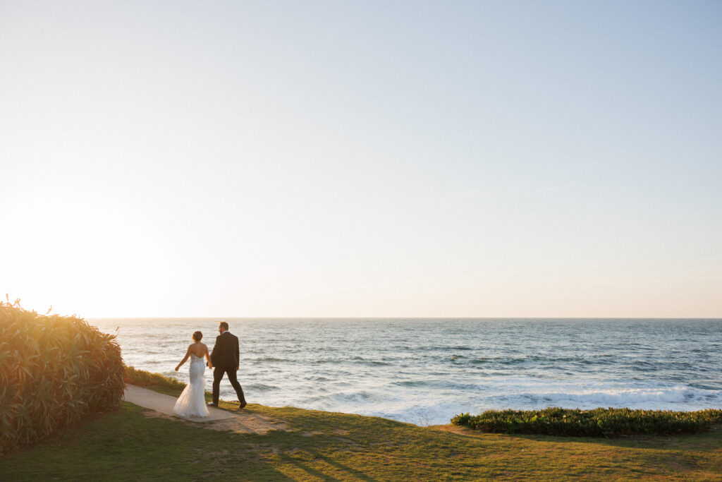 couple walks off into the sunset together on their wedding day