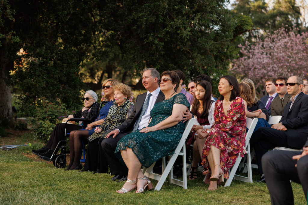 guests watch during wedding ceremony