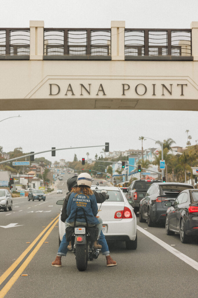couple rides their motorcycle in Dana Point