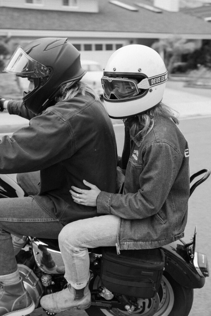 couple takes off on their motorcycle together