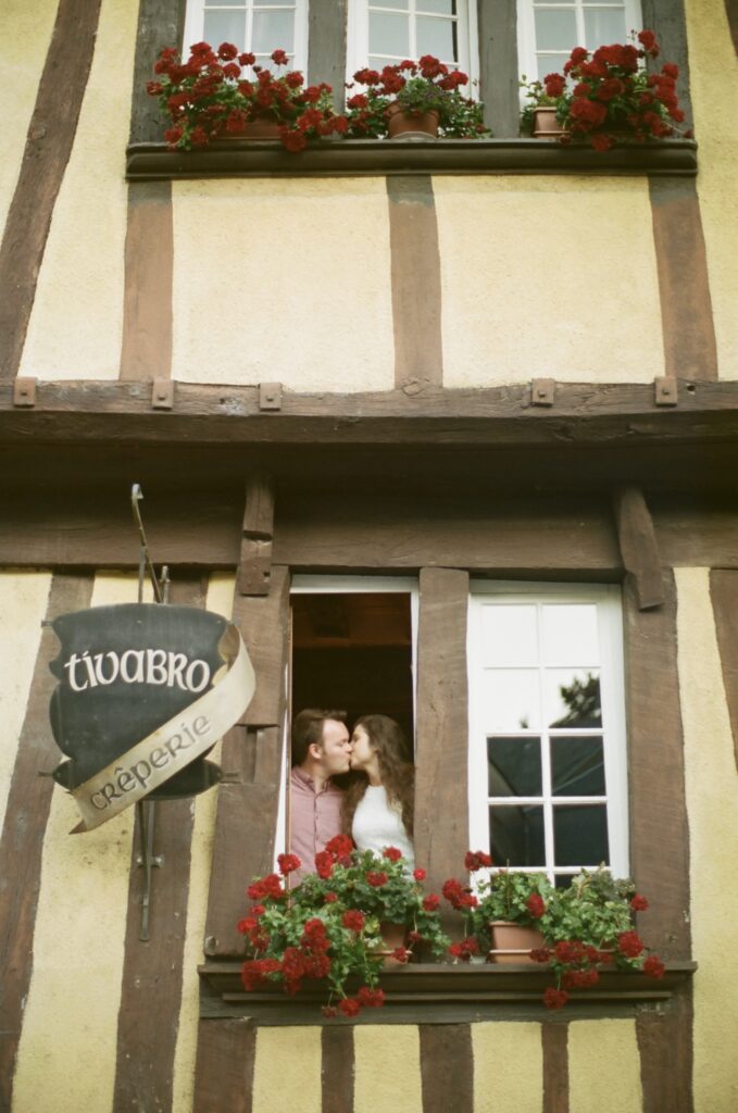 bride and groom celebrate their rehearsal dinner at a crepe restaurant in brittany, france 