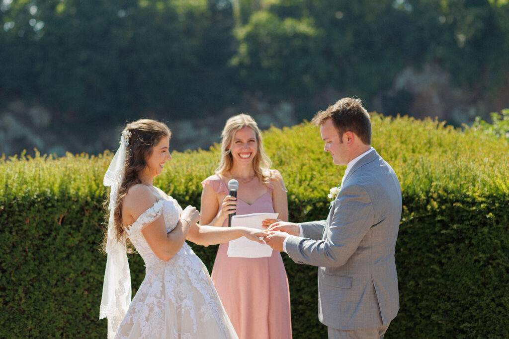 bride and groom exchange vows in English and French 