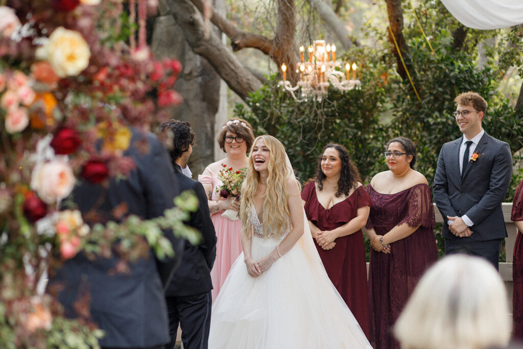 bride laughs during intimate vow exchange at her Calamigos Ranch wedding in Malibu