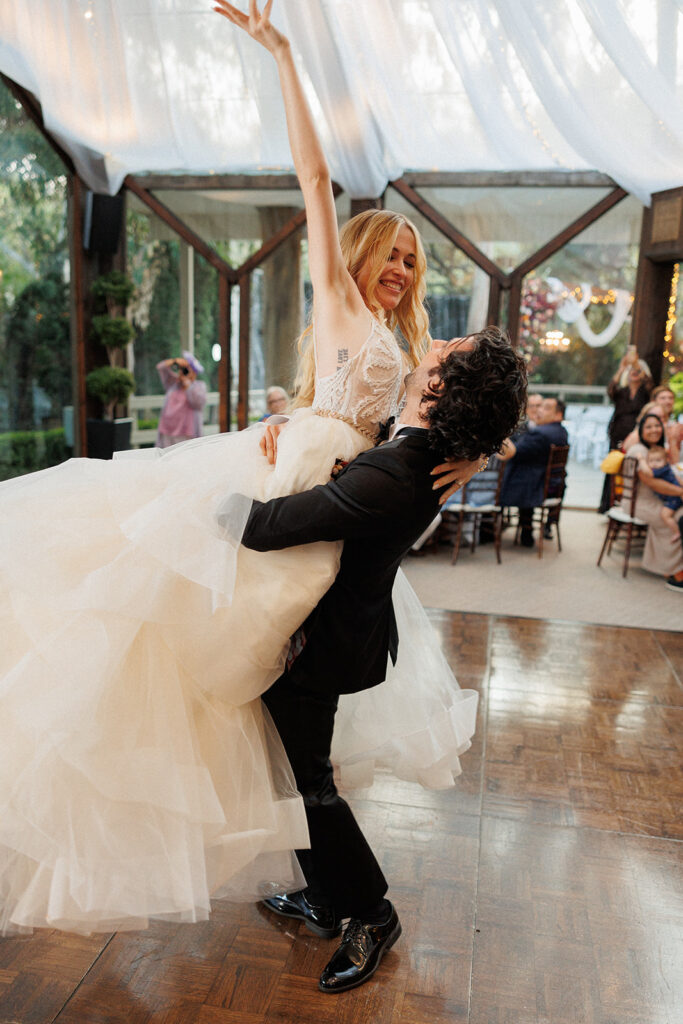 actor Noah James spins his Bride Norma during their first dance at their Calamigos Ranch wedding