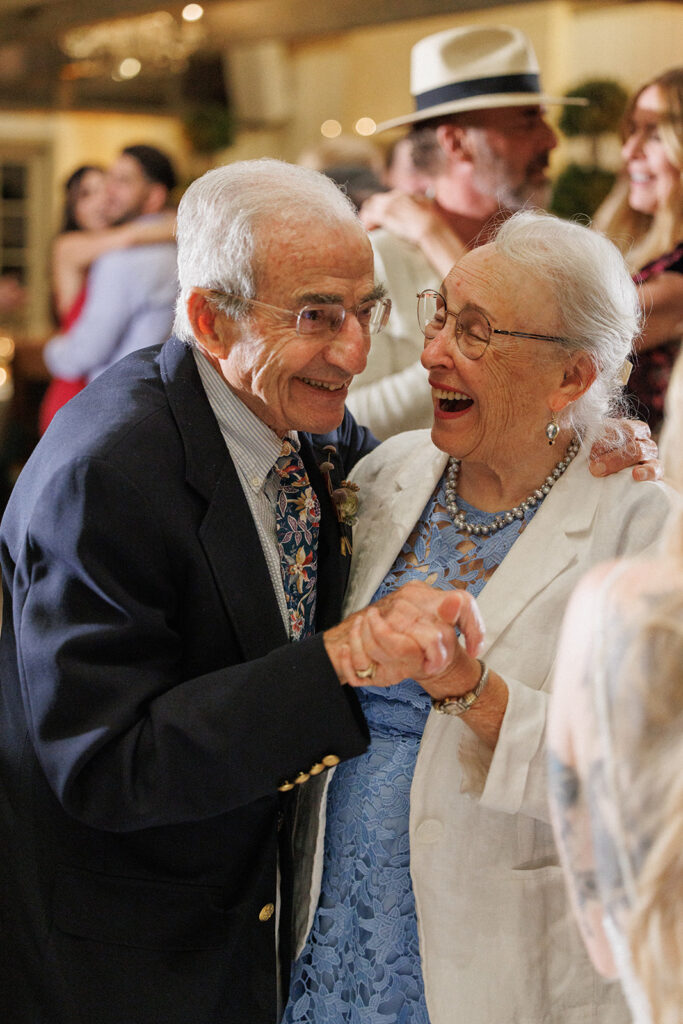 the groom's grandparents celebrated 50 years of marriage with a dance at the wedding