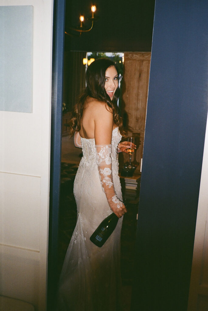 Bride getting ready to have some champagne 