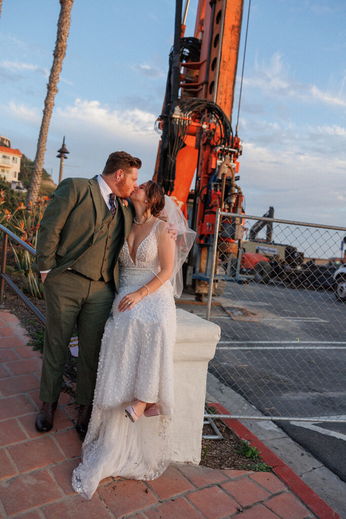 bride and groom and the big orange crane!