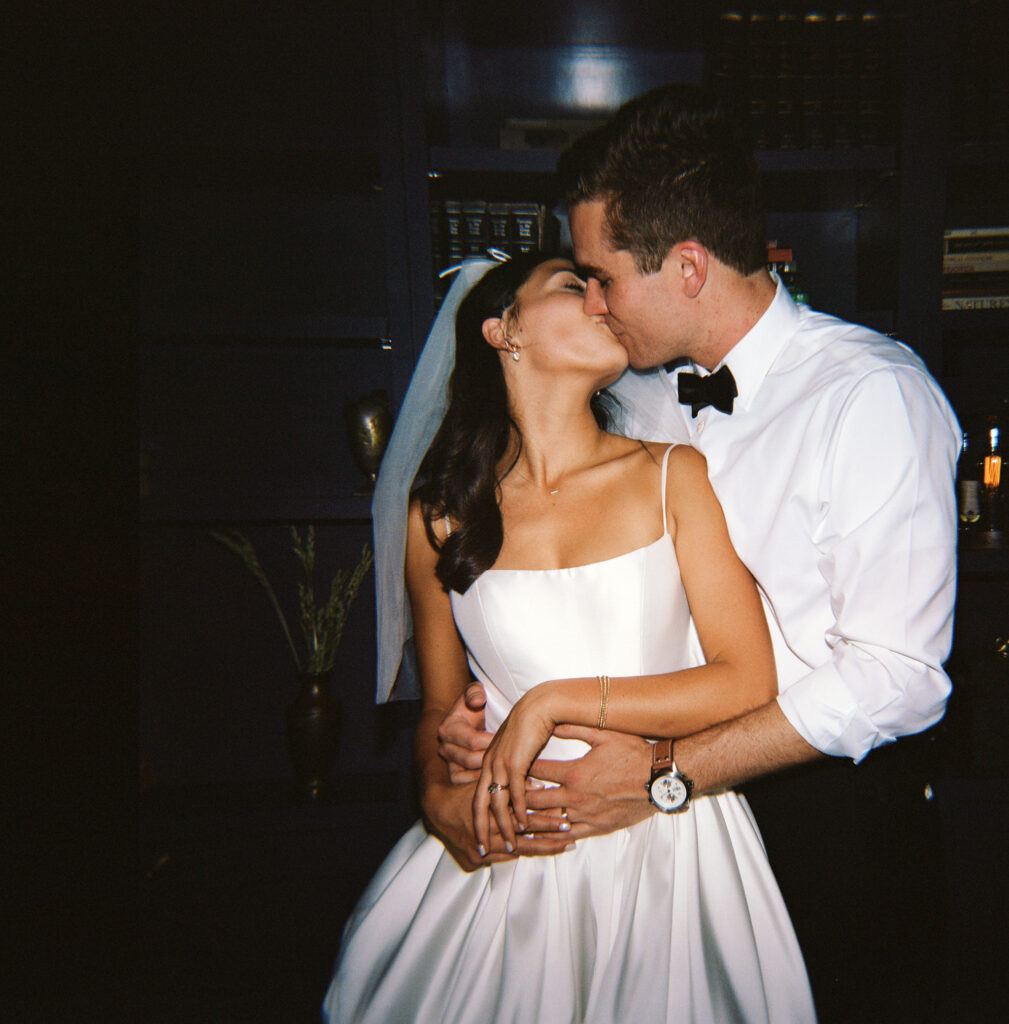 film photo of bride and groom kissing! 