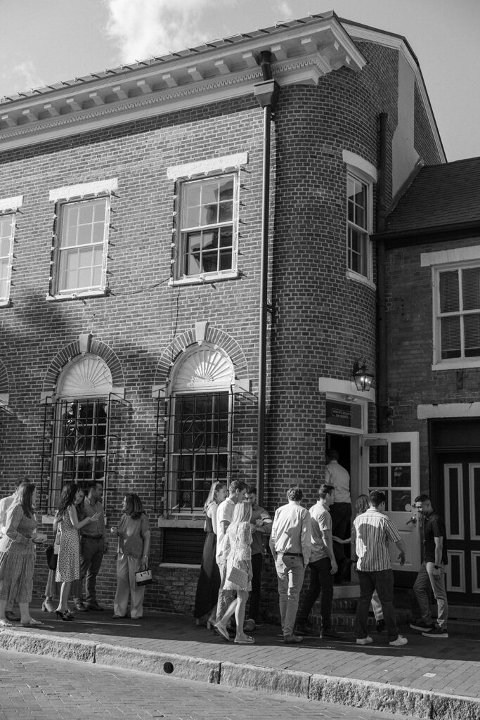 historical building and wedding guests