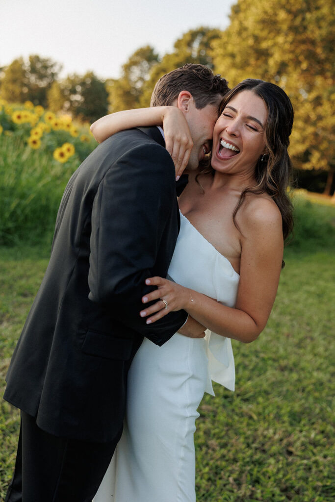 kissing the bride and laughing 